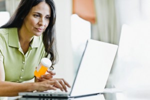 Woman Refilling Prescription Online